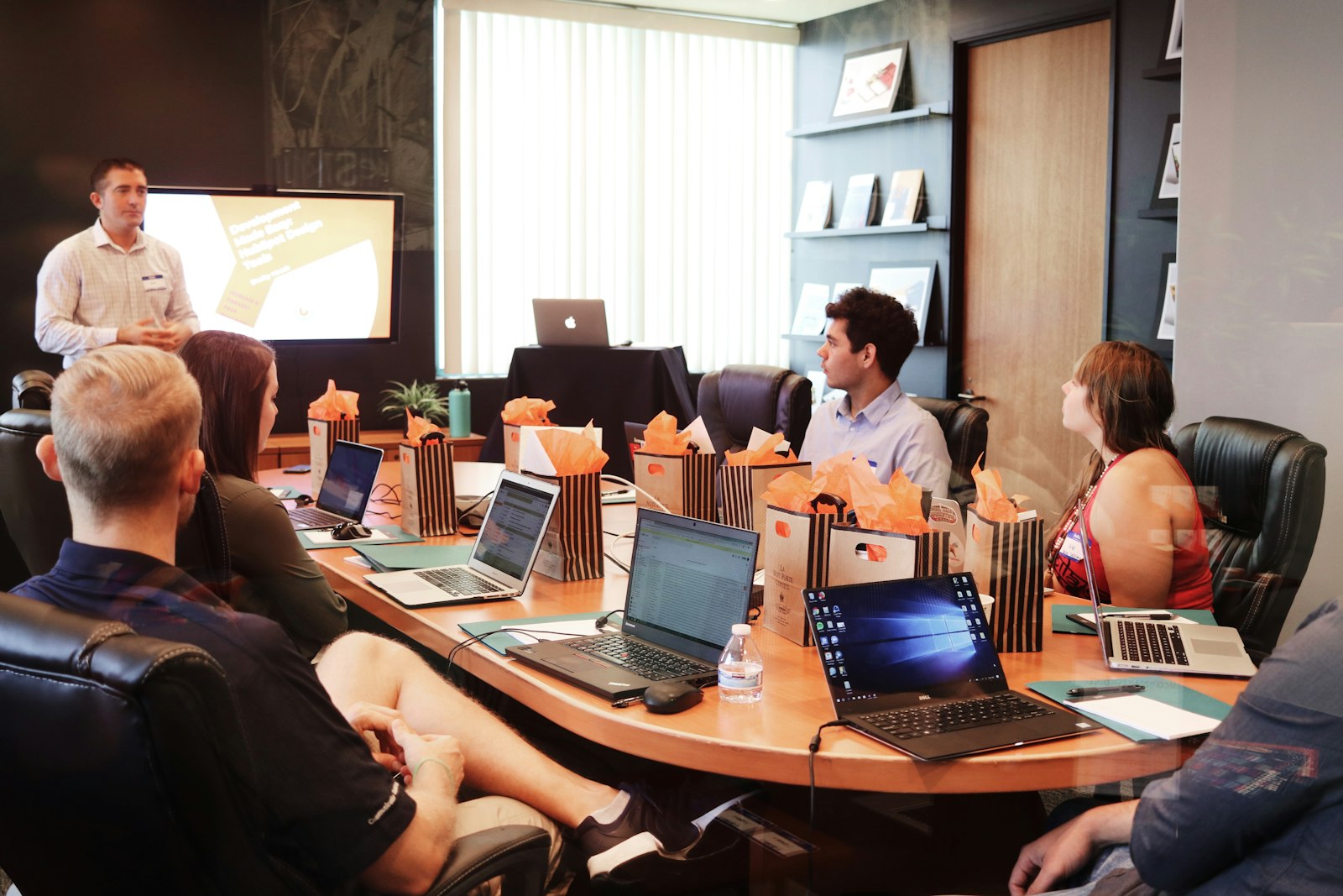 The ProLedger team collaborating around a conference table